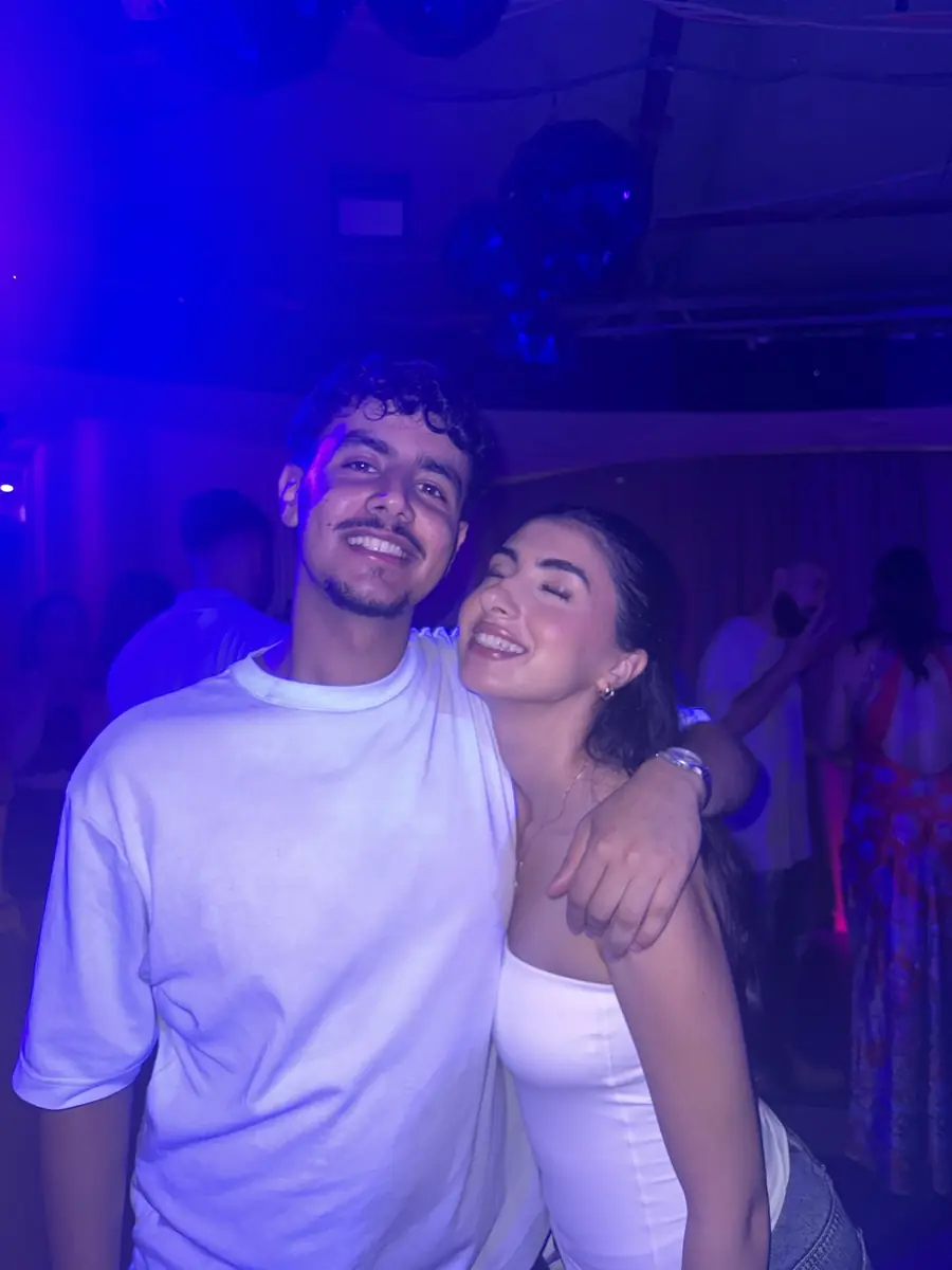 Salwa and Marchi under blue lights