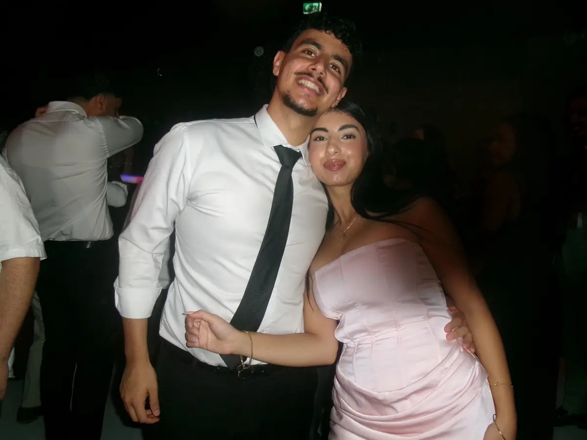Salwa and Marchi dancing at the formal