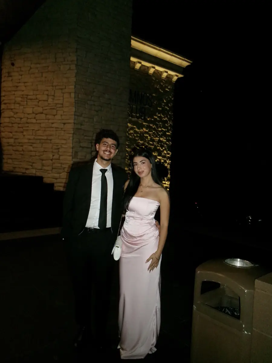 Salwa and Marchi dressed for a formal night